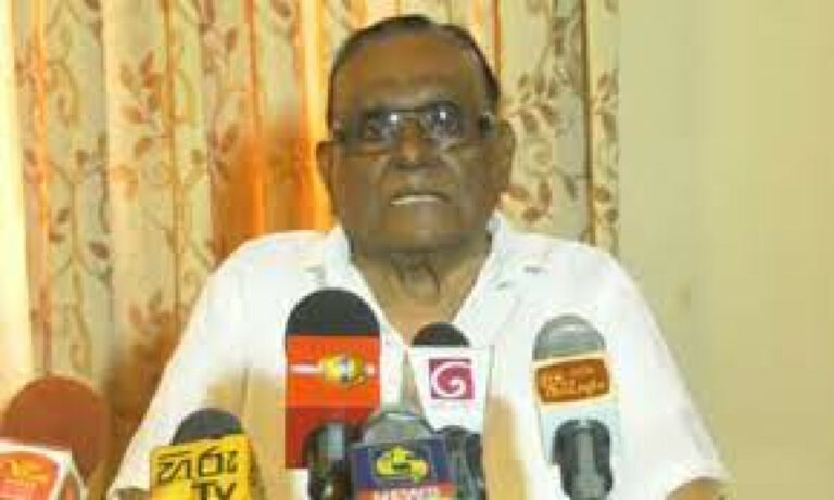 කට නිසා රාජා කොල්ලුරේ කොමියුනිස්‍ට් පක්ෂ සභාපති ධුරයෙන් දොට්ට