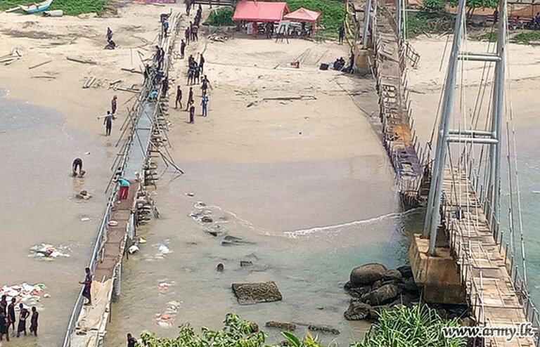 යුදහමුදා භටයින්ගේ කරමතින් ඉදිවන පරෙවි දූපතේ තාවකාලික පාලම යුදහමුදා භටයින්ගේ කරමතින් ඉදිවන පරෙවි දූපතේ තාවකාලික පාලම