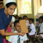 Children from the Mahaberiyatenna Tamil school in Digana receiving free health checks compliments of SriLankan Cares, the corporate social responsibility arm of SriLankan Airlines II